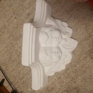 Ceramic baby angels self